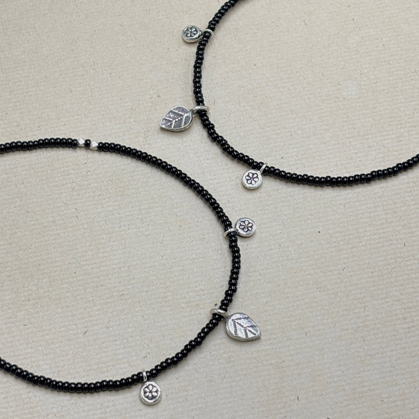Mystic Leaf – Black & Silver Leaf Charm Anklet