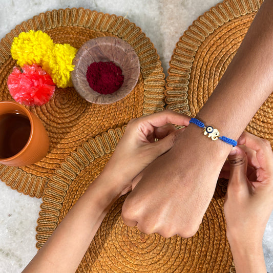 Vighnaharta - Evil Eye & Ganesha Gold Rakhi